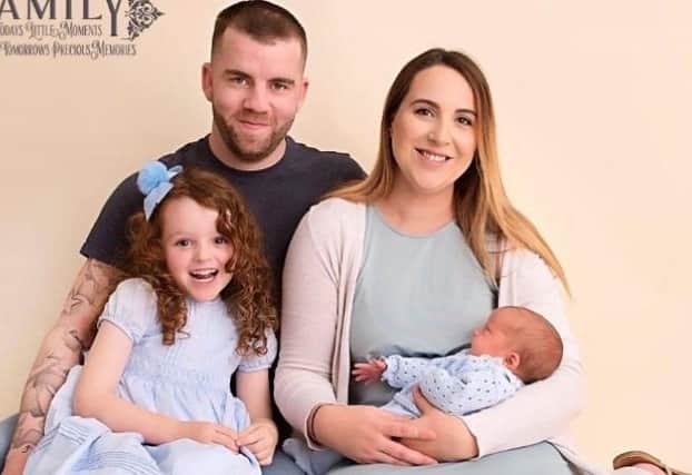 Jamie Cantrill with his partner Tanya Wilkinson and their children