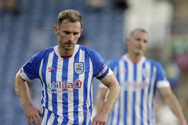 Huddersfield Town's Tom Lees appears dejected after a first-half onslaught by Preston (Picture: Richard Sellers/PA)