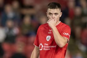 Patrick Kelly got the opening for Barnsley at Stockport.