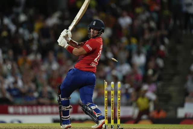 GOT HIM: England's Liam Livingstone is bowled by West Indies' Andre Russell during the first T20 cricket match at Kensington Oval in Barbados Picture: AP/Ricardo Mazalan