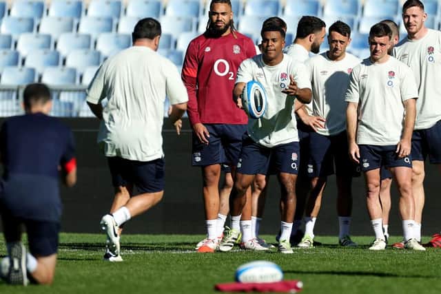 New start: Immanuel Feyi-Waboso of England passes the ball to Jamie George during the England Captain's Run ahead of the Guinness Six Nations 2024 (Picture: David Rogers/Getty Images)