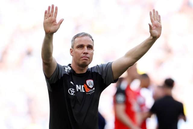 FAREWELL: Michael Duff acknowledges the fans after his final game in charge of Barnsley, a League One play-off final defeat to Sheffield Wednesday
