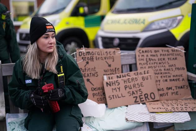 Ambulance workers on the picket line. PIC: Jacob King/PA Wire