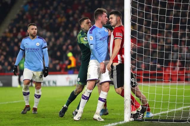 AGGRESSION: John Egan goes toe to toe with Aymeric Laporte in 2020