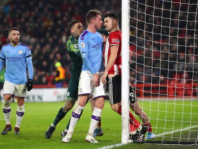 AGGRESSION: John Egan goes toe to toe with Aymeric Laporte in 2020
