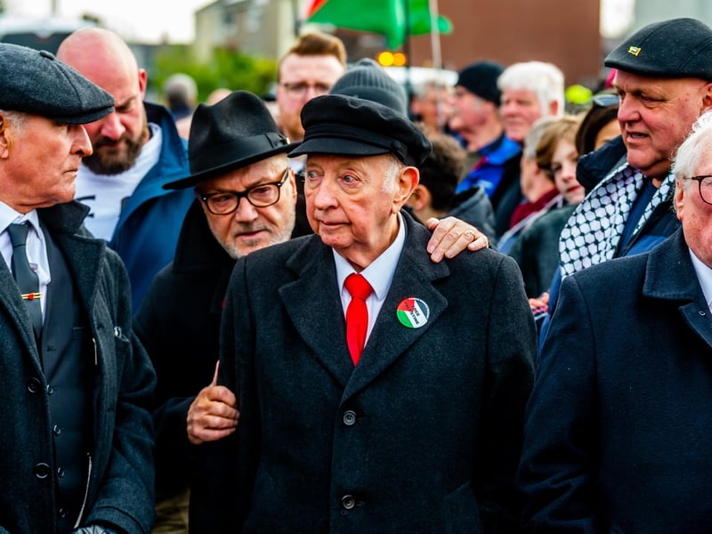 George Galloway, MP for Rochdale grabs hold of the Former miners' leader Arthur Scargill, 86, before he gave a speech at the Hatfield Pit Club. Picture By Yorkshire Post Photographer,  James Hardisty. Date: 9th March 2024.