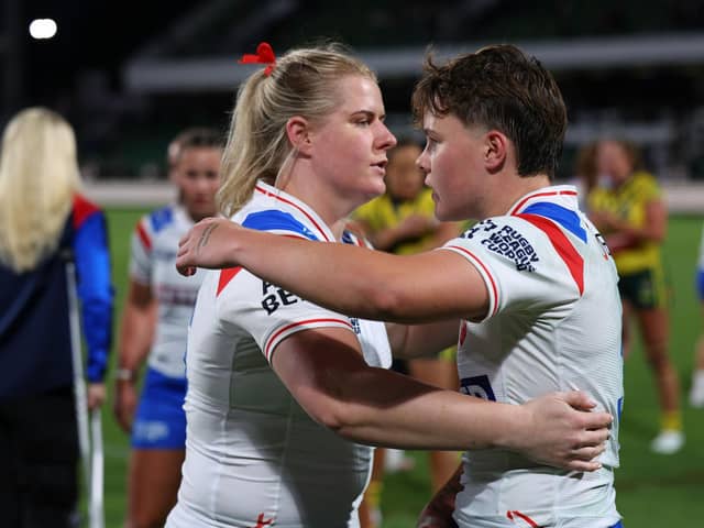England's Vicky Whitfield and Molly Jones as their side loses to Australia.