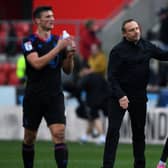 Huddersfield Town head coach André Breitenreiter pictured at the final whistle at Rotherham United as away fans make their feelings known. Picture: Jonathan Gawthorpe