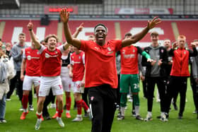 Doing it the right way: Rotherham United players celebrate staying in the Championship with a game to spare, following their 1-0 win over Middlesbrough on Monday, much to the delight of chairman Tony Stewart (Picture: Simon Hulme)