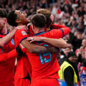 MAGIC MARKER: England's Harry Kane celebrates with his team-mates after scoring his side's third goal of the game from the penalty spot at Wembley Stadium. Picture: John Walton/PA