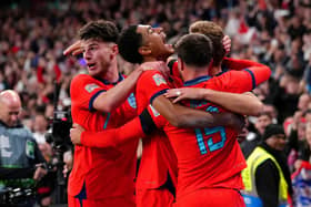 MAGIC MARKER: England's Harry Kane celebrates with his team-mates after scoring his side's third goal of the game from the penalty spot at Wembley Stadium. Picture: John Walton/PA
