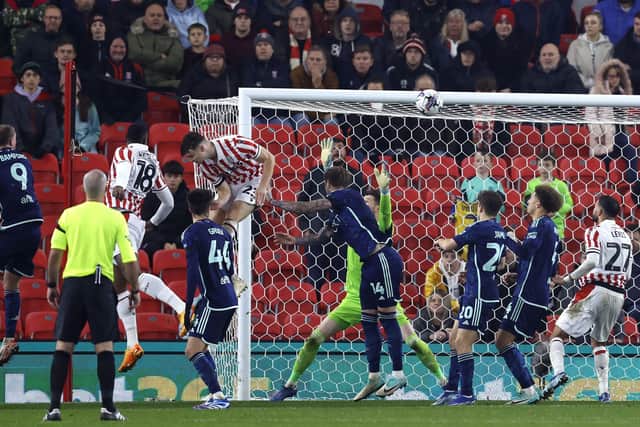IN OFF: Leeds United's Pascal Struijk scores an own goal, Stoke City's winning goal at the bet365 Stadium Picture: Nigel French/PA