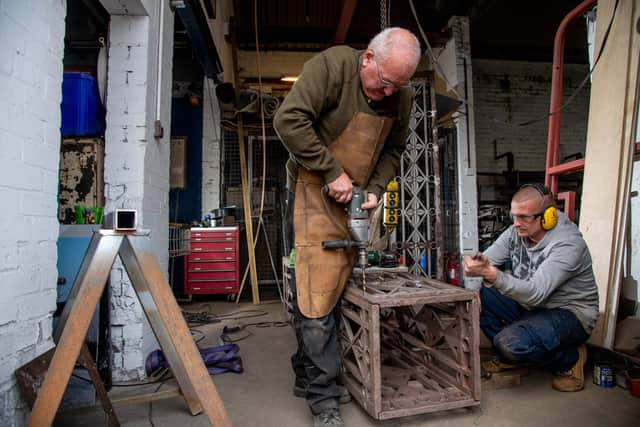 Feature at Ridgeway Forge, Attercliffe, Sheffield, to restore some gas lamps.
Forge owner Andrew Renwick, left, with Gary Ayres working on some of the lamp stands.
MARK BICKERDIKE PHOTOGRAPHY