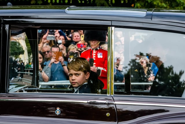 The State Funeral of Her Majesty The Queen, on The Mall, London. Pictured Prince George, travelling along The Mall.