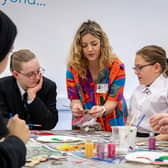 Sami Lovett, founder of the not-for-profit PIECES project, working with young people as part of a recent PIECES project programme at a school in Leeds.