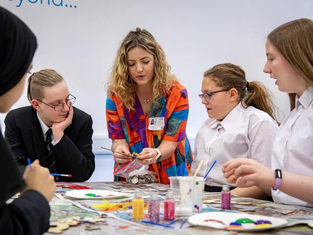 Sami Lovett, founder of the not-for-profit PIECES project, working with young people as part of a recent PIECES project programme at a school in Leeds.