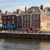 Historic Cumberland House jutting out onto the bank of the River Ouse