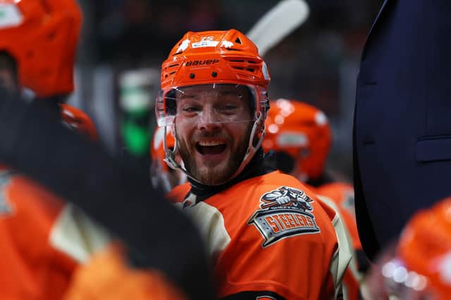 REASONS TO BE CHEERFUL: Sheffield Steelers' captain Robert Dowd shows his delight on the bench during Saturday's 9-3 home win over Manchester Storm, in which he drew level with club legend Ron Shudra in the all-time goalscoring list on 329 goals. Picture: Hayley Roberts/Steelers Media