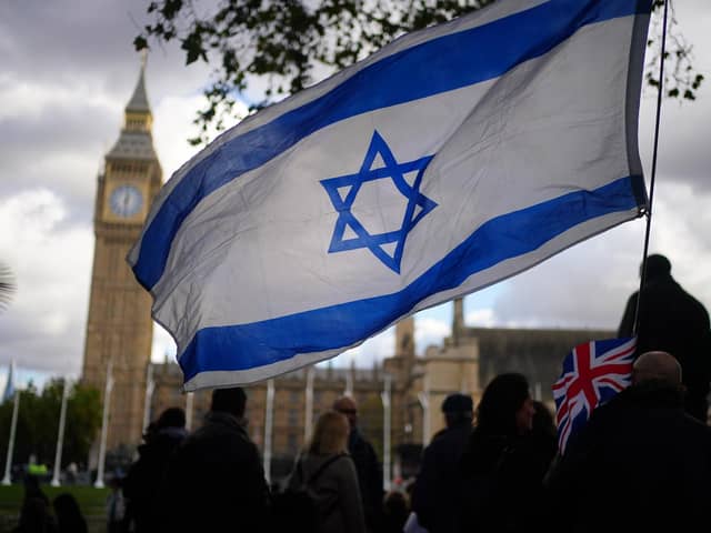 People taking part in a pro-Israel rally in Parliament Square in London. PIC: Victoria Jones/PA Wire