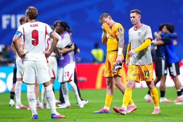 TOUGH TO TAKE: England's show their disappointment after defeat to Argentina. Picture: Bradley Collyer/PA