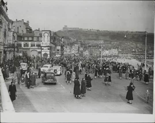 In Scarborough, the very old custom of Shrove Tuesday, is celebrated in the old fashioned way. Almost everyone in Scarborough, make their way to Foreshore Road, and children young and old, skip all along the foreshore, and motorist for once have to drop to walking pace. Photo taken 08 February, 1951.