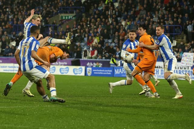 HEADING FOR VICTORY: Jacob Greaves scores Hull City's stoppage-time winner at Huddersfield Town