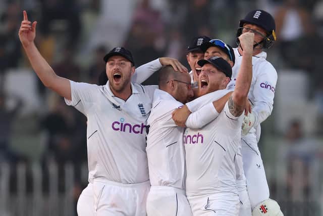 Ollie Robinson, Jack Leach and Ben Stokes of England celebrate a dramatic victory over Pakistan in the first Test. (Picture: Matthew Lewis/Getty Images)
