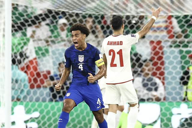 Tyler Adams of United States reacts following the team's first goal during the FIFA World Cup Qatar 2022 Group B match between IR Iran and USA at Al Thumama Stadium (Picture: Tim Nwachukwu/Getty Images)