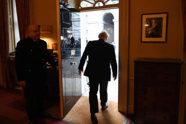 LONDON, ENGLAND - NOVEMBER 06: Prime Minister Boris Johnson leaves 10 Downing Street for Buckingham Palace on November 6, 2019 in London, England. The British Prime Minister is visiting Queen Elizabeth II at Buckingham Palace to officially mark the dissolution of Parliament ahead of a December 12th General Election. This will be the first winter election held in the U.K. for nearly a century, with the 1923 election producing a hung parliament. (Photo by Stefan Rousseau - WPA Pool /Getty Images)