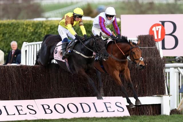 Paul Townend on board Galopin Des Champs (L) jumps the last ahead of Harry Cobden on board Bravemansgame on their way to winning the Boodles Cheltenham Gold Cup Chase. Bravemansgame will look to defend his Charlie Hall title at Wetherby on Saturday (Picture: Ryan Pierse/Getty Images)