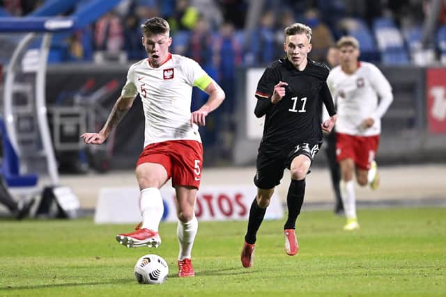 Kacper Lopata, left, in action for Poland Under-20s against Germany U20 (Picture: Adam Nurkiewicz/Getty Images)