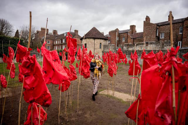 "The Red Bags" by Bea Last, part of the Aesthetica Art Prize. Photo: Charlotte Graham