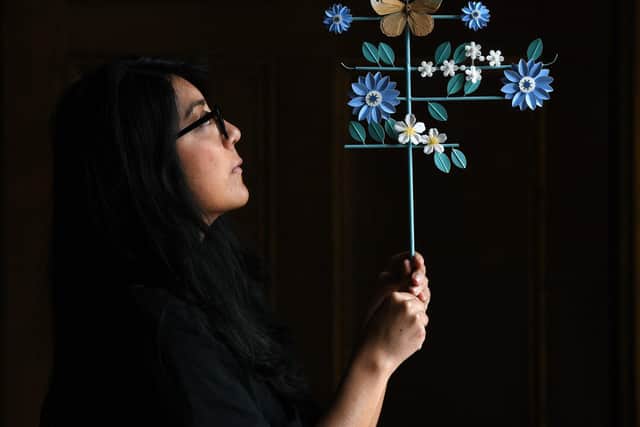 Columbian artist Diana Beltran Herrera installing a series of beautiful paper birds in the Chinese Drawing Room at Temple Newsam House, which forms part of a new exhibition called Inside Out, Yorkshire Post photographer Jonathan Gawthorpe.