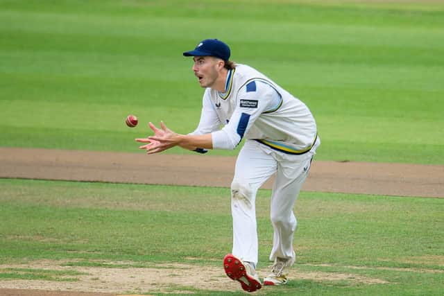 Eyes on the ball: James Wharton takes a catch to dismiss Charlie Allison from the bowling of Kuldeep Yadav. Picture by Allan McKenzie/SWpix.com