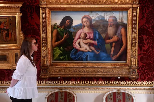 Harewood House Trust presents Colours Uncovered - the story of colours found in the collections at Harewood House from the Renaissance to the present day. Rebecca Burton Curator and Archivist is pictured with the painting Madonna and Child with St John and St Jerome by Alvise Vivarini and Marco Basaiti. Picture taken by Yorkshire Post Photographer Simon Hulme