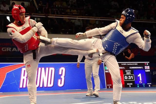 Aiming high: Huddersfield's Caden Cunningham, right, in action on the world taekwondo circuit where he is one of the world's best heavyweight's heading into next summer's Paris Olympics.