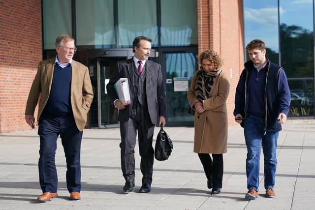 Hannah Ingram-Moore, the daughter of the late Captain Sir Tom Moore, with husband Colin (left) and son Benjie (right),   at Central Bedfordshire Council in Chicksands, Bedfordshire, for a hearing to appeal against an order to demolish an unauthorised spa pool block built at her home.