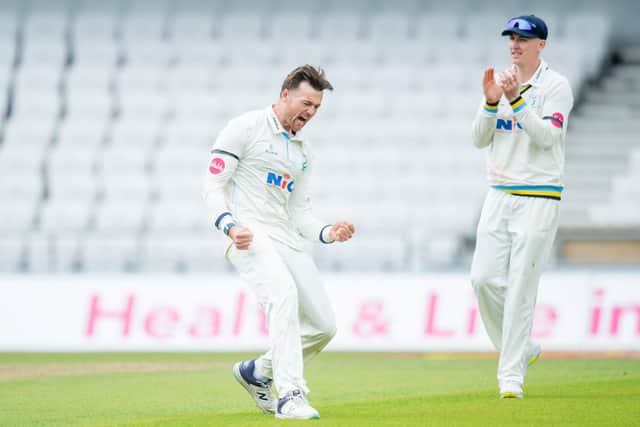 Dan Moriarty is applauded by his Yorkshire team-mate Harry Brook after dismissing Glamorgan's Billy Root at Headingley. Picture by Allan McKenzie/SWpix.com