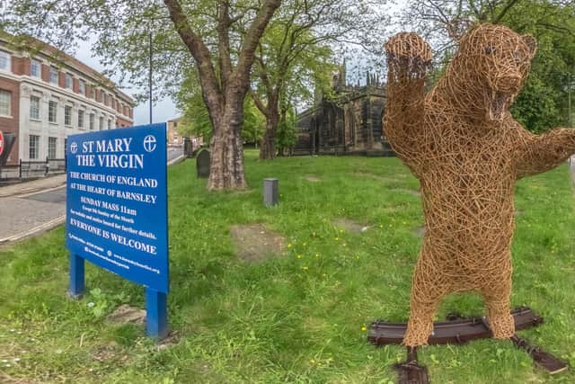 This bear willow sculpture - outside St Mary's Church - celebrates a bear cave sculpture on the Trans Pennine Trail in Royston.