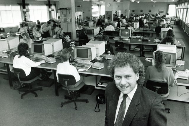 Mick Rodgers, manager, and workers at Sheffield Eldon House Telephone Exchange in 1988. Look at those screens!