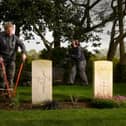 Helen is pictured hedge trimming around the grave of Sidney William Cairns with Nicola Lees cutting the grass Picture taken by Yorkshire Post Photographer Simon Hulme