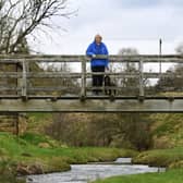 Claire Hall who has  worked for the charity Ryedale Carers Support for 30 years and is doing a sponsored walk, walking the perimeter of Ryedale (91 miles over 7 days) to highlight the loneliness and isolation often experienced. Claire walking through Hutton-Le-Hole.