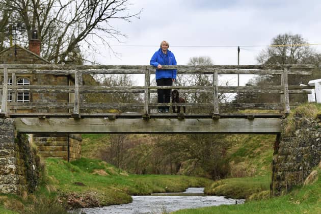 Claire Hall who has  worked for the charity Ryedale Carers Support for 30 years and is doing a sponsored walk, walking the perimeter of Ryedale (91 miles over 7 days) to highlight the loneliness and isolation often experienced. Claire walking through Hutton-Le-Hole.
