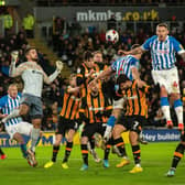 EXPERIENCE: Huddersfield Town's Martyn Waghorn, jumping to head the ball