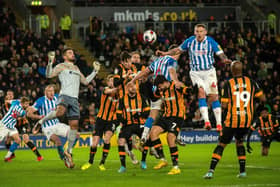 EXPERIENCE: Huddersfield Town's Martyn Waghorn, jumping to head the ball