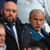 Huddersfield Town chairman and owner Kevin Nagle (centre),flanked by sporting director Mark Cartwright (left) and chief executive officer Jake Edwards (right).