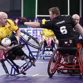Mike Mellon of Scotland is tackled by Andrew Higgins of Wales during the Wheelchair Rugby League World Cup Group B match between Wales and Scotland at English Institute of Sport on November 10, 2022 in Sheffield (Picture: George Wood/Getty Images)