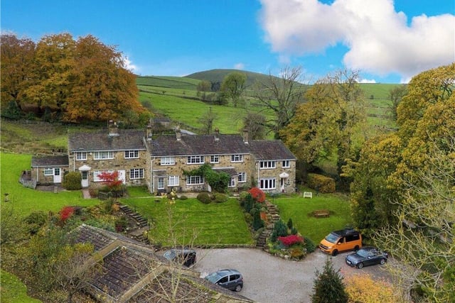 The property is one in a small development tucked away on the edge of Burnsall that comes with garages and parking