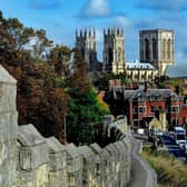 Standing out from the crowd, the magnificent York Minster seen from the winding path of the York city walls