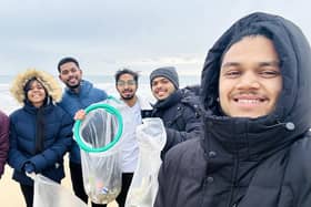 Vivek Gurav (middle-right) with a group of volunteers during his plogging tour of the UK. Issue date: Friday January 6, 2023.